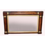 A William IV rosewood and gilt mirror, the rectangular plate surrounded by pilasters 46cm high, 76cm