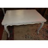 A painted extending dining table in the French style 140cm length