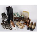 A collection of ladies vintage shoes and a pair of black leather boots.