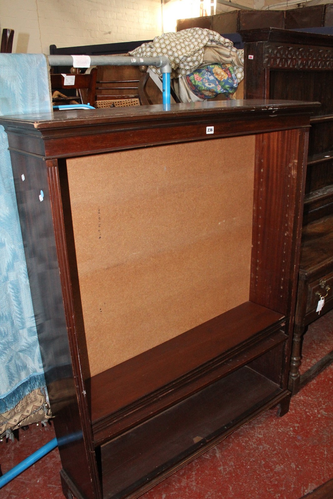 A 19th Century style open bookcase with adjustable shelves on bracket feet 153cm high, 115cm wide