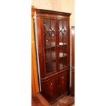 A George III style mahogany floor standing corner cupboard 211cm high, 92cm wide