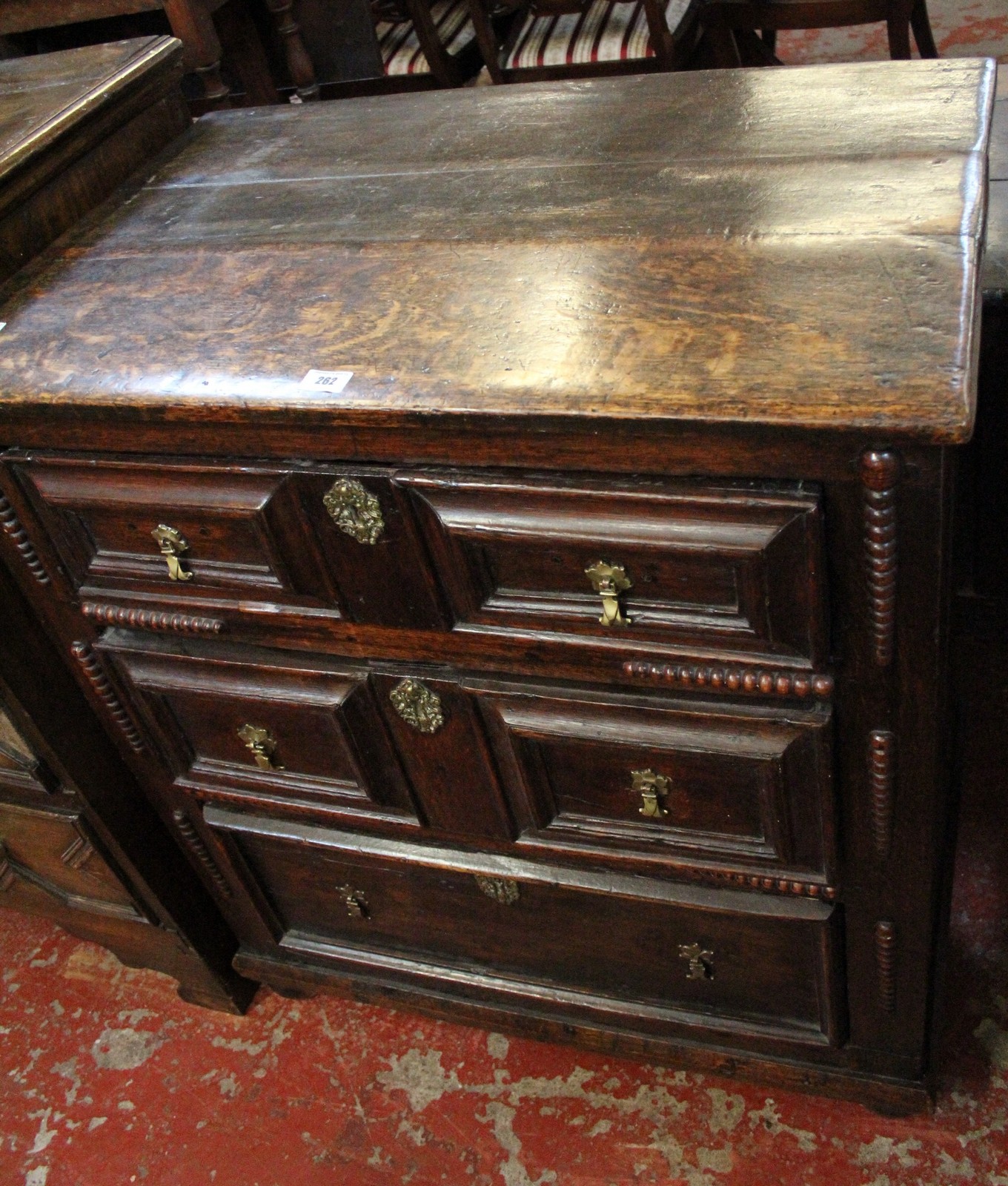 A late 18th Century oak chest of drawers with three long drawers 81cm wide