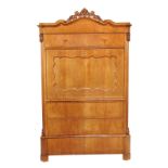 An Austrian birch and burr maple secretaire a abbatant, circa 1830-40, with carved crest over a