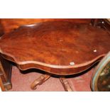 *A Victorian centre table with a frieze drawer on carved stem and splayed legs 127cm wide