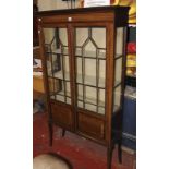 An Edwardian mahogany display cabinet.170cm high, 91cm wide