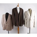 A quantity of Vintage menswear, comprising shirts, jackets, knitwear and trousers.