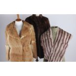 A vintage fur coat in its original shop bag- "Dobs Furs of Cardiff" together with a quantity of