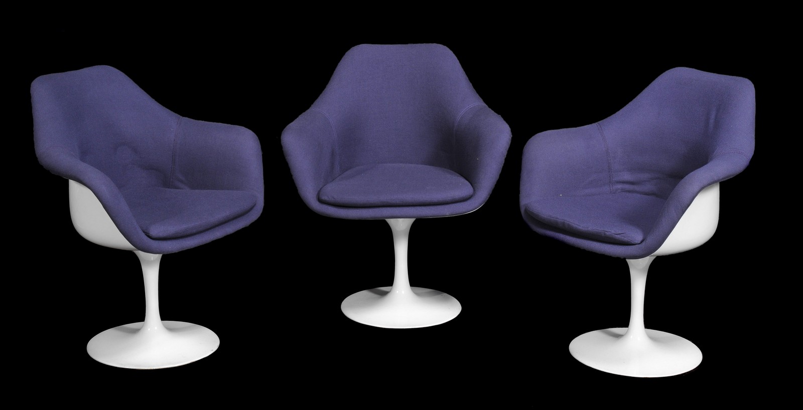 A set of six upholstered white coated fibreglass and aluminium Tulip chairs, after a design by