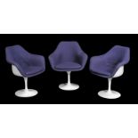 A set of six upholstered white coated fibreglass and aluminium Tulip chairs, after a design by