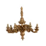 An Italian carved and giltwood seven light chandelier in 18th century style, second quarter 20th