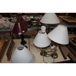 A pair of modern metal table lamps with cream shades, 65cm high approx. four matching metal table