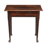 A George II walnut side table , circa 1735  A George II walnut side table  , circa 1735, the