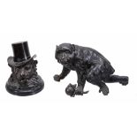 A Continental patinated bronze and marble mounted inkstand cast as a lion  A Continental patinated