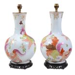 A pair of Continental tobacco leaf style vases  A pair of Continental tobacco leaf style vases  , of