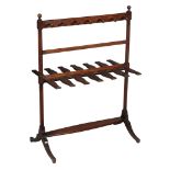 A mahogany boot rack, first half 19th century, to take six pairs  A mahogany boot rack, first half