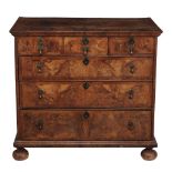 A George II walnut chest of drawers, circa 1740  A George II walnut chest of drawers,   circa