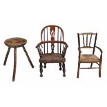 An elm and ash child's windsor chair, early 19th century with a hooped back  An elm and ash child'