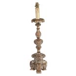 An Italian carved and silvered wood altar candlestick  An Italian carved and silvered wood altar