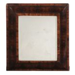 A William and Mary oyster veneered walnut mirror, circa 1695  A William and Mary oyster veneered