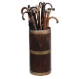 A brass bound oak cylindrical stickstand , second quarter 19th century  A brass bound oak