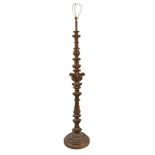 An early 20th century Italian carved walnut standard lamp , in Baroque taste  An early 20th