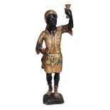 A carved and painted blackamoor figure, 19th century  A carved and painted blackamoor figure,   19th