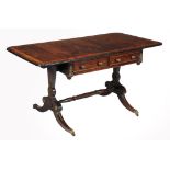 A Regency rosewood and gilt metal mounted sofa table, circa 1815  A Regency rosewood and gilt