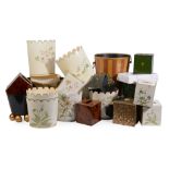An assortment of mostly waist-paper baskets and paper tissue box covers  An assortment of mostly