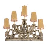 An Italian carved and silvered wood five light candelabrum  An Italian carved and silvered wood five