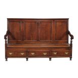 A George III oak settle, late 18th/early 19th century  A George III oak settle,   late 18th/early