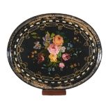 A Victorian black lacquered, painted and parcel gilt papier mache oval tray  A Victorian black