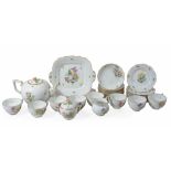 A modern Herend part tea service painted with flower-sprays within...  A modern Herend part tea