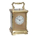 A French lacquered brass carriage clock with push-button repeat Unsigned  A French lacquered brass