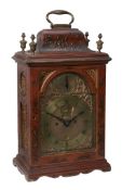 A rare George III red japanned table clock James Smith, London  A rare George III red japanned table