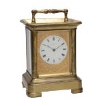 A fine gilt brass giant carriage timepiece with original mahogany outer...  A fine gilt brass