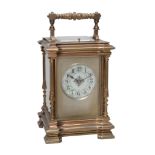 A French brass carriage clock with push-button repeat Margaine, Paris  A French brass carriage clock