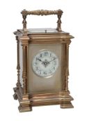 A French brass carriage clock with push-button repeat Margaine, Paris  A French brass carriage clock