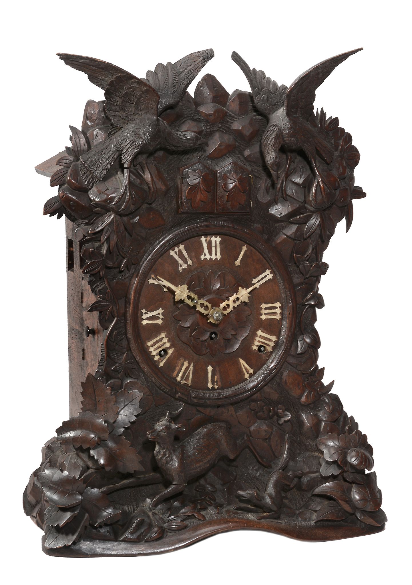 A rare Black Forest carved wood quarter-striking cuckoo table clock...  A rare Black Forest carved - Image 2 of 3