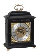 A William III ebony table clock Charles Gretton, London  A William III ebony table clock Charles