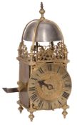 A brass miniature lantern timepiece with alarm Unsigned late 17th century...  A brass miniature