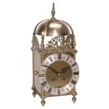 A Victorian brass lantern clock The dial bearing signature for Richard Rayment  A Victorian brass