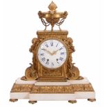 An impressive French Louis XVI style ormolu and white marble mantel clock...  An impressive French