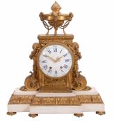 An impressive French Louis XVI style ormolu and white marble mantel clock...  An impressive French