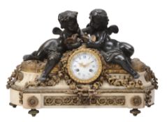 A French gilt and patinated bronze figural mounted white marble mantel clock...  A French gilt and