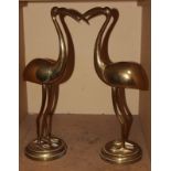 A pair of modern brass flamingos, 52cm high approx.