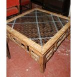 * A Chinese style large coffee table, with a glass top 97cm wide