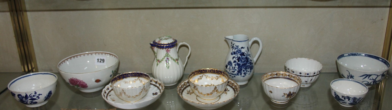 A selection of mostly Worcester porcelain to include tea bowls and saucers, small jugs, and two