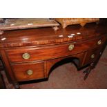 A George IV mahogany bowfront sideboard, with one long drawer and two short on ring turned legs 99cm