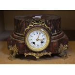 A 19th century French red marble 'Plinth form' mantel clock, ormolu mounts, enamel Roman numeral