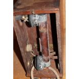 A Great War period British field telephone, in its original mahogany box, stamped 'G&Co. Ltd. -